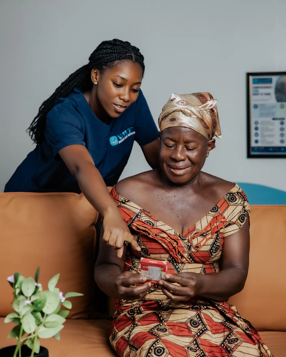 Postnatal nurse supporting a mother and newborn at home in Accra